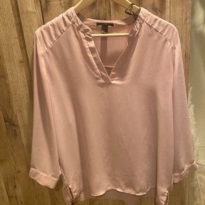 Light pink V-neck blouse
